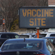 A sign greeting people who arrive to line up for covid-19 vaccines at Nassau Community College on January 10, 2021 in Garden City, New York.